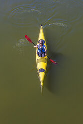 Germany, woman kayaking - WDF003252