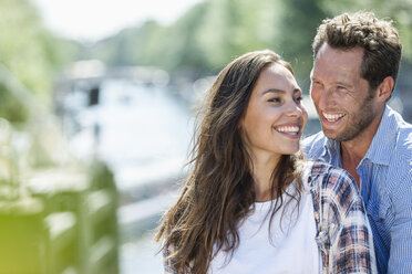 Netherlands, Amsterdam, happy couple outdoors - FMKF002133