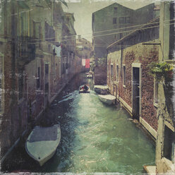 Italiy, Venice, boat on canal - LVF003814