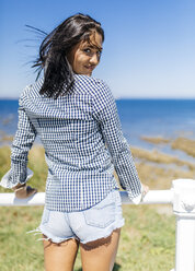 Spain, Gijon, attractive teenage girl at the coast - MGOF000990