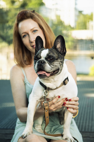 Portrait of dog with owner in the background stock photo