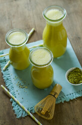 Three glass bottles of matcha smoothie - ODF001324