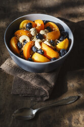 Bowl of muesli with cracked buckwheat, fruits, sesame and cashew nuts - EVGF002240