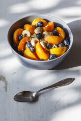 Bowl of muesli with cracked buckwheat, fruits, sesame and cashew nuts - EVGF002241