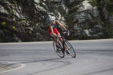 Switzerland, Engadin, cyclist on Bernina Pass - FFF001456