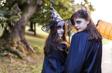 Portrait of two masquerade girls at Halloween - MGOF000746