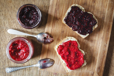 Homemade raspberry and blackberry jam with chia seeds, slices of bread - EVGF002436