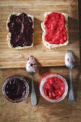 Homemade raspberry and blackberry jam with chia seeds, slices of bread - EVGF002435