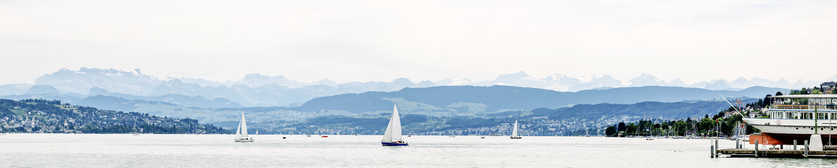 Switzerland, Zurich, Lake Zurich with boats in cloudy day, panorama - BZF000252