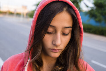 Sad girl wearing pink hoodie - GEMF000422