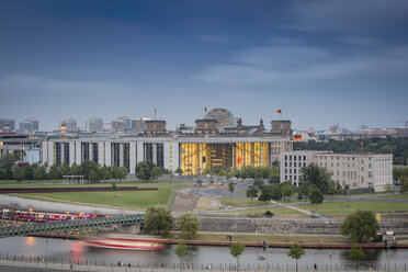 Germany, Berlin, Reichstag and Spree river at dusk - NKF000411