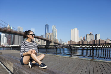 USA, New York City, relaxing young woman - GIOF000130