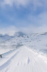 Bulgaria, Rila Mountains, Belmeken Dam, snowy bridge during cold windy winter - BZF000256