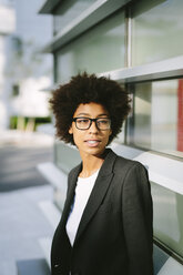 USA, New York City, portrait of businesswoman wearing glasses - GIOF000191