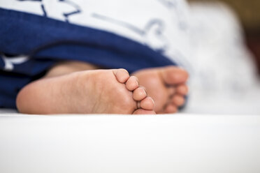 Foot of little girl sleeping in bed - JFEF000711