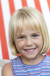 Portrait of smiling blond girl - JFEF000726