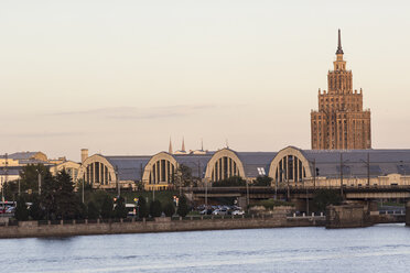 Latvia, Riga, Academy of Science and market hall behind the Daugava river - MELF000090