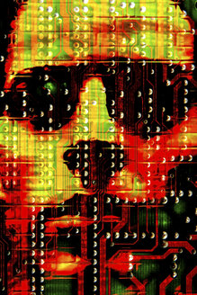 Ominous face on circuit board, illustration - HOHF001358