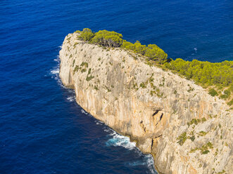 Spain, Mallorca, near Cap Formentor, rocky coast in the evening - AMF004308