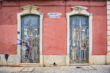 Portugal, facade of an old house with two entry doors - VTF000449