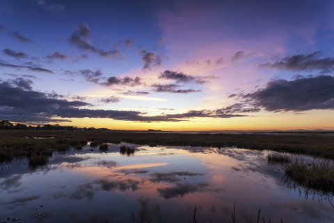 Schottland, East Lothian, Sonnenuntergang über der Aberlady Bay, lizenzfreies Stockfoto