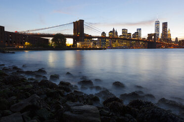 USA, New York, New York City, Manhattan, Brooklyn Bridge at sunset - GIOF000331