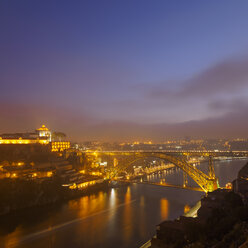 Portugal, Grande Porto, Porto, Luiz I Bridge and Douro river, Mosteiro da Serra do Pilar in the evening - LAF001509