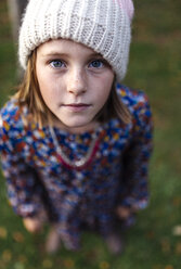 Portrait of serious looking girl wearing woollen cap - MGOF000949