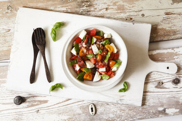 Salad with mozzarella, tomatoes, slices of melon - EVGF002480