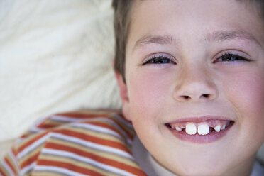 Portrait of smiling little boy with tooth gap - RMAF000052