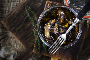 Preserving jar of pickled champignons with herbs - SBDF002393