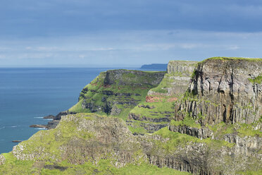 UK, Northern Ireland, County Antrim, basalt and sandstone cliffs at Causeway Coast - ELF001681