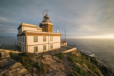 Spain, Finisterre, view to lighthouse at twilight - RAEF000603