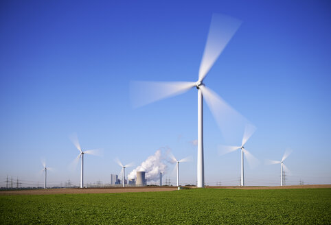 Germany, North Rhine-Westphalia, Neurath, Wind wheels and mining power plant - GUFF000156