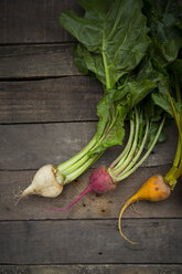 Organic beetroots on wood, yellow, white and red - LVF004127