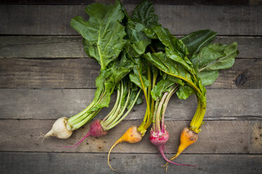 Organic beetroots on wood, yellow, white and red - LVF004128