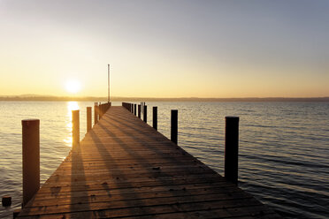 Germany, Bavaria, Starnberg lake, boat bridge at sunset - LHF000485