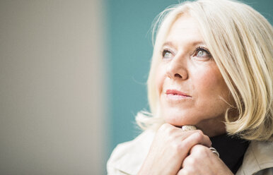 Portrait of pensive blond woman - UUF006035