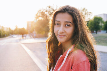 Portrait of happy girl at backlight - GEMF000482