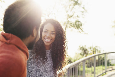 Portrait of happy young woman face to face with her boyfriend - EBSF001065