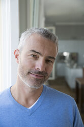 Portrait of a mature man at home - FKF001560