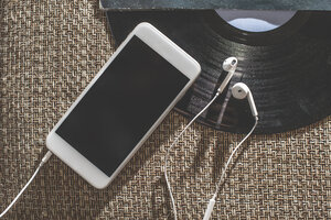 Smartphone, earphones and a record - DEGF000583