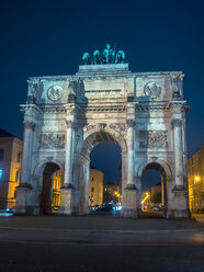 Germany, Munich, view to illuminated Victory Gate by night - KRPF001642