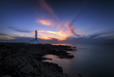 Spain, Balearic Islands, Menorca, Faro de Favaritx, Lighthouse at sunset - SMAF000396