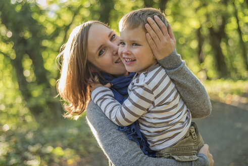 Mother with little son on her arms - PAF001481