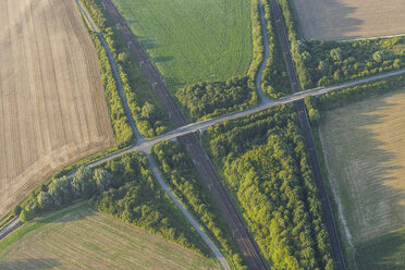 Germany, Lower Saxony, Hildesheim, aerial view of fields, bridge and tracks - PVCF000727