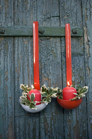 Christmas decoration made of soup ladles and candles stock photo