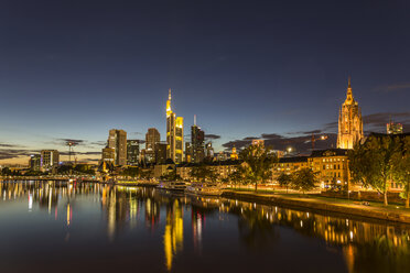 Germany, Frankfurt, River Main at night, Skyline of finanial district in background - MABF000346