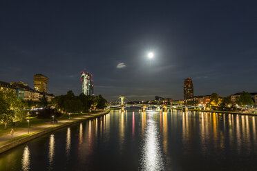 Germany, Frankfurt, River Main at night, Skyline of finanial district - MABF000349