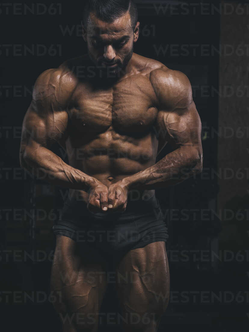 Young bodybuilder showing chest muscles in front pose Indian Body Builders  Association show, Balewadi, Baner, Pune Maharashtra India Stock Photo -  Alamy